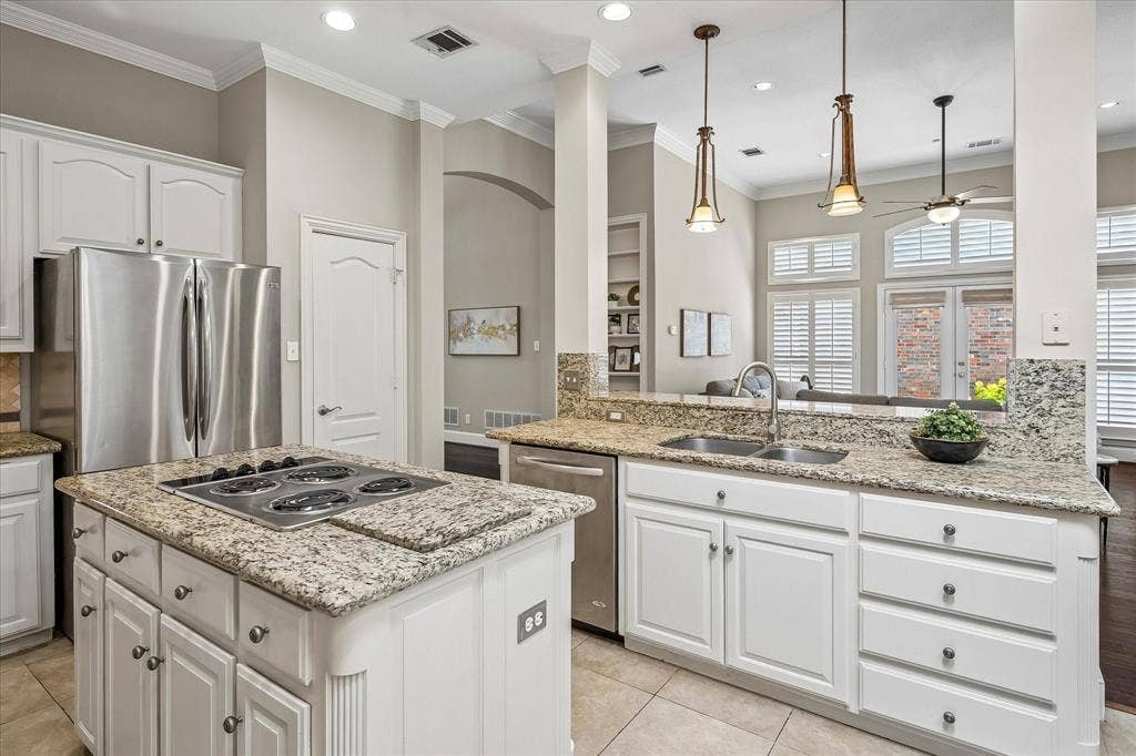 6708 Myrtle Beach Drive, Plano, TX 75093 Another kitchen view with door to pantry.