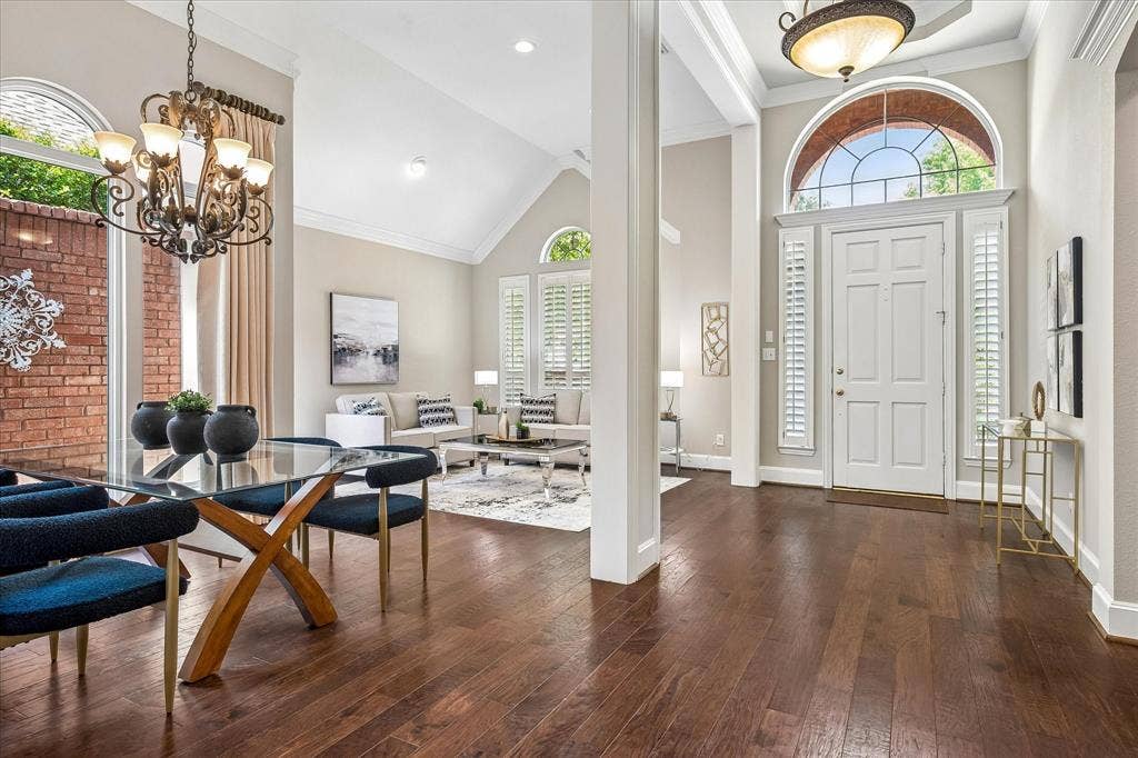 6708 Myrtle Beach Drive, Plano, TX 75093 Entry with Tray ceiling, stacked formals. Crown moldings, Wood flooring, Plantation Shutters continue throughout home.