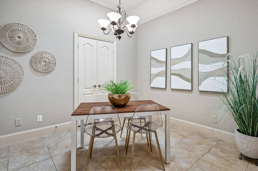 6708 Myrtle Beach Drive, Plano, TX 75093 Breakfast area opens to laundry room, supporting both electric or gas dryer, additional cabinets and shelved closet.