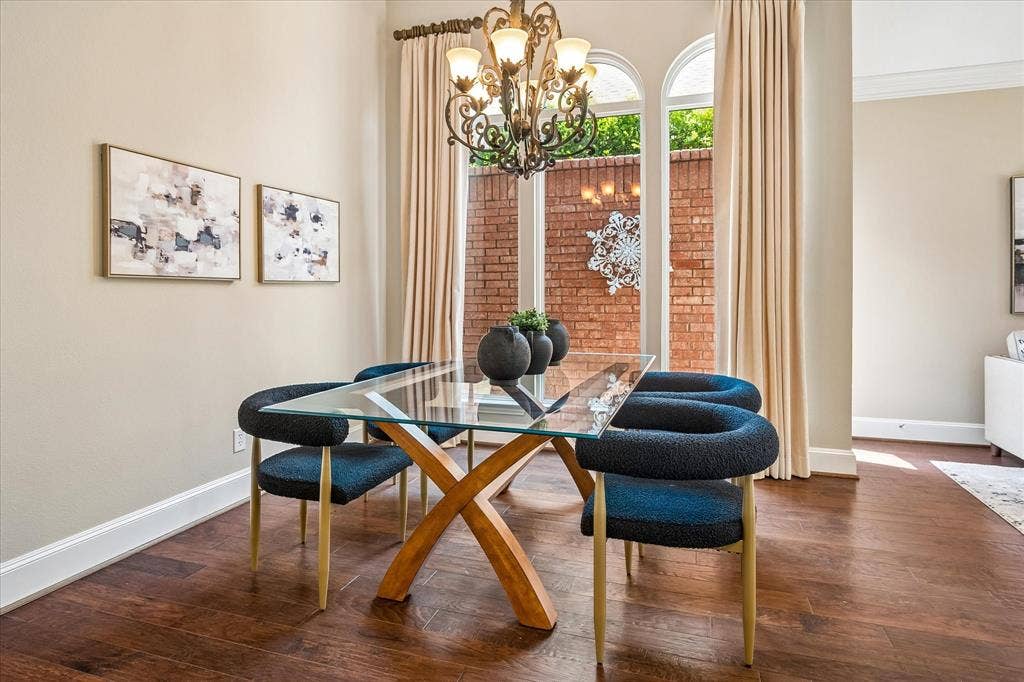 6708 Myrtle Beach Drive, Plano, TX 75093 Dining Room overlooks small, narrow, outdoor courtyard.
