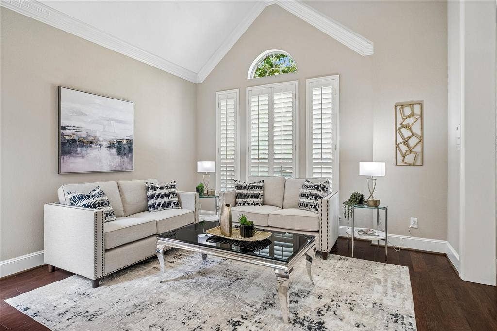 6708 Myrtle Beach Drive, Plano, TX 75093 Living room with crown molding, shutters, wood flooring. Or transform into a study, game room, etc.!