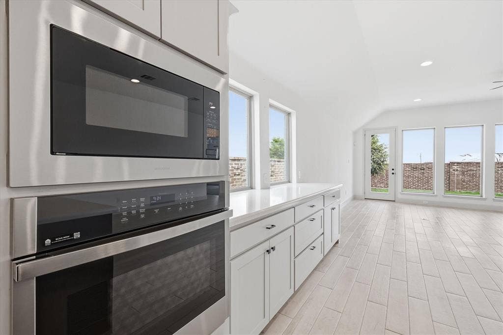 787 Cedarwood Court, Haslet, TX 76052 Built-in stainless steel microwave and oven combination