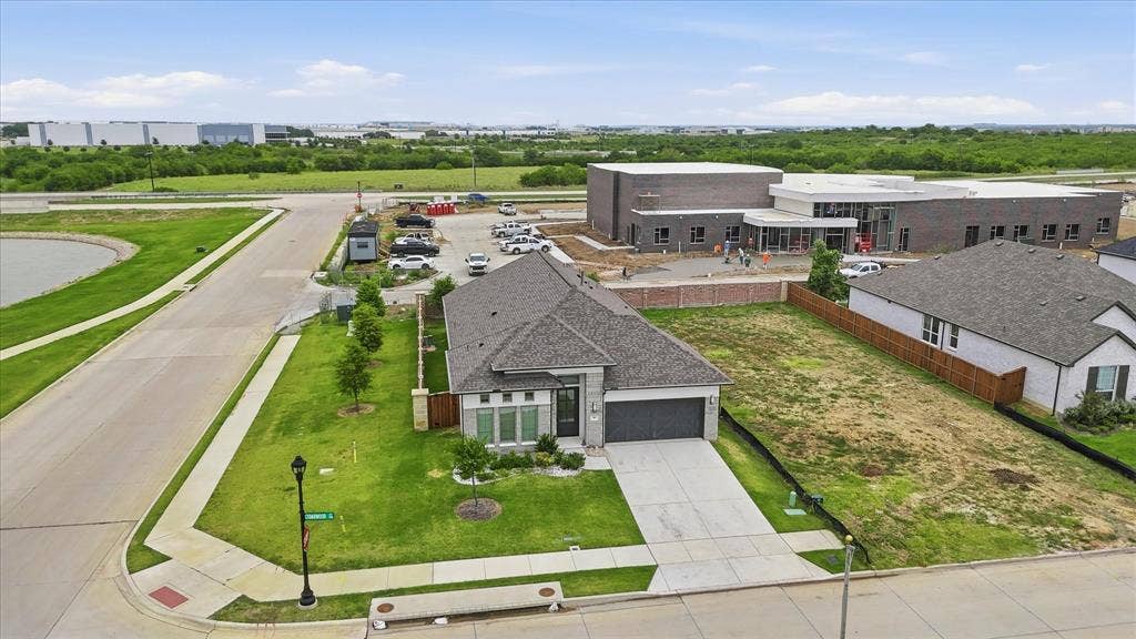 787 Cedarwood Court, Haslet, TX 76052 Contemporary single-story residence featuring a two-car garage, concrete driveway, and front landscaping