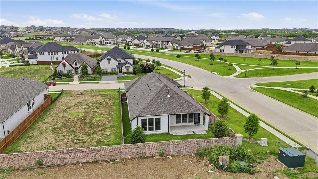 787 Cedarwood Court, Haslet, TX 76052 Spacious residential lot featuring a level building area, a partial retaining wall, and established surrounding properties