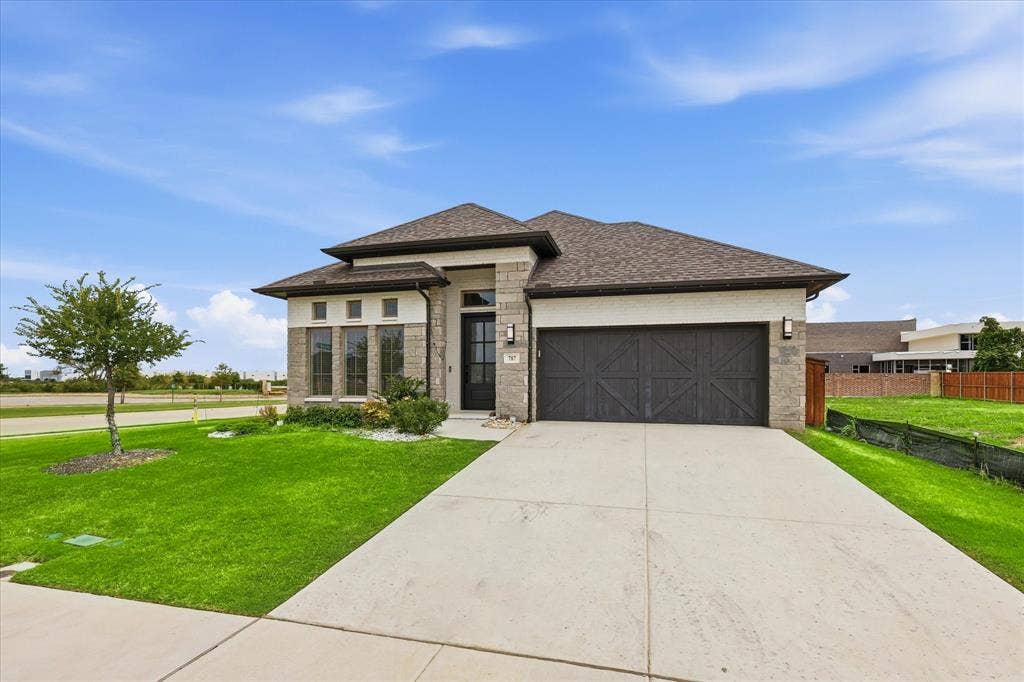 787 Cedarwood Court, Haslet, TX 76052 Contemporary single-story residence with a dark brown shingle roof and light brick facade