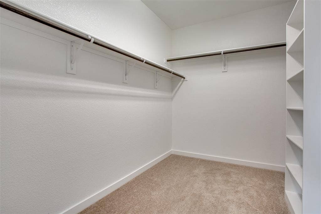 1432 Monarch Trail, Northlake, TX 76226 Large walk-in closet with built-in shelves
