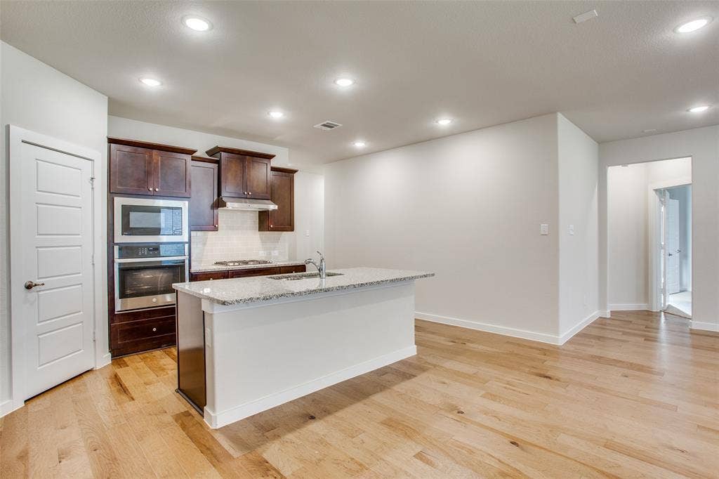 1432 Monarch Trail, Northlake, TX 76226 The social hub of the house