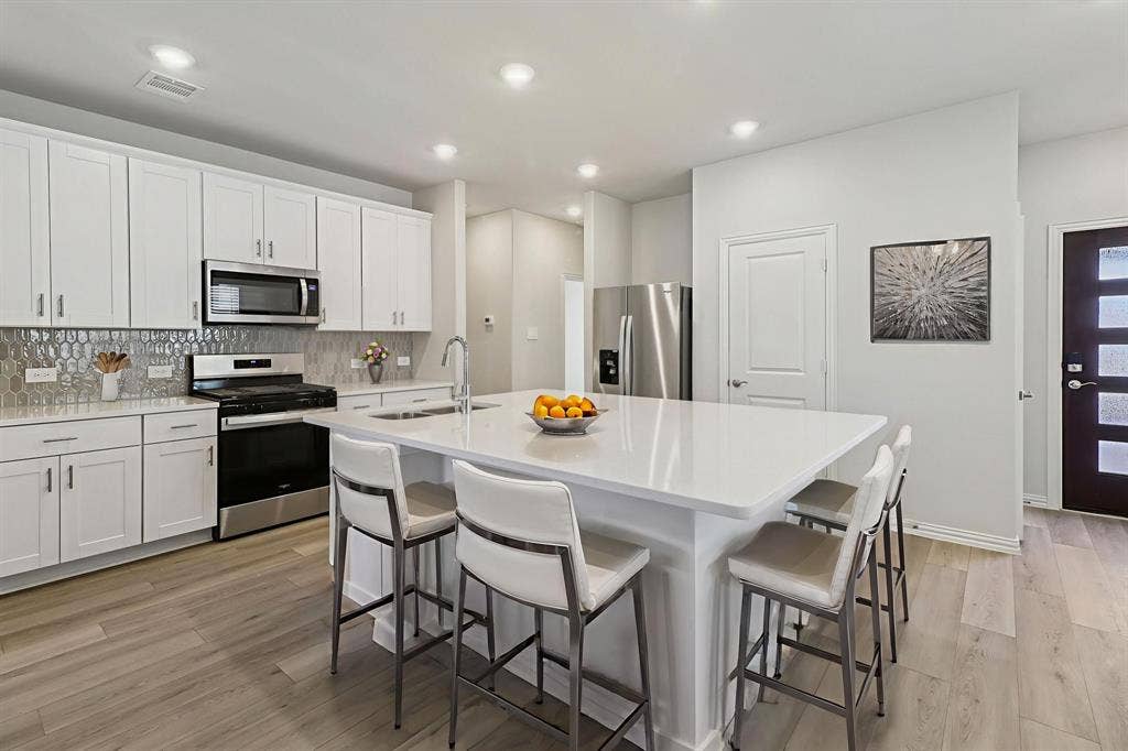 Photo is not of the actual home, but is an inspirational photo of builder’s model home and may depict options, furnishings, and/or decorator features that are not included.