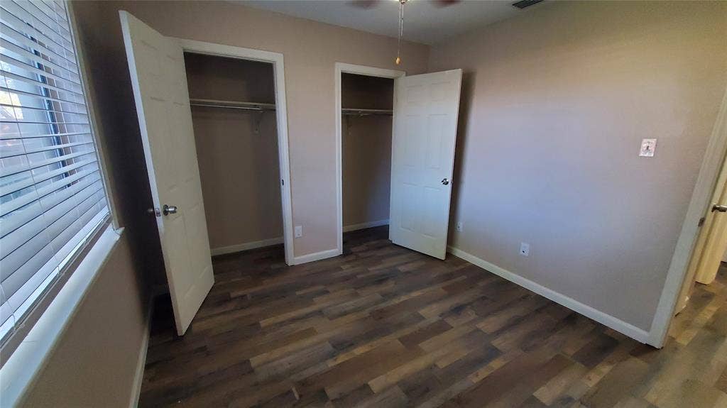 8440 Willow Creek Drive, Frisco, TX 75034 Bedroom 2 with large pass through closet space and ceiling fan.