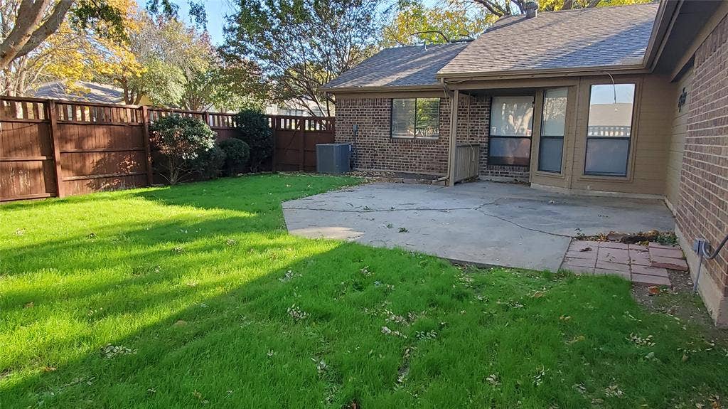 8440 Willow Creek Drive, Frisco, TX 75034 View of yard with a patio and central AC unit
