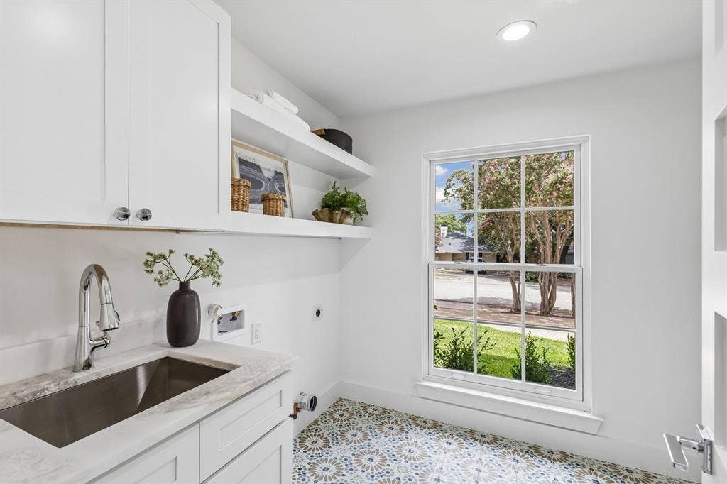 7124 Meadow Road, Dallas, TX 75230 Convenient Laundry and oversized pantry area with sink