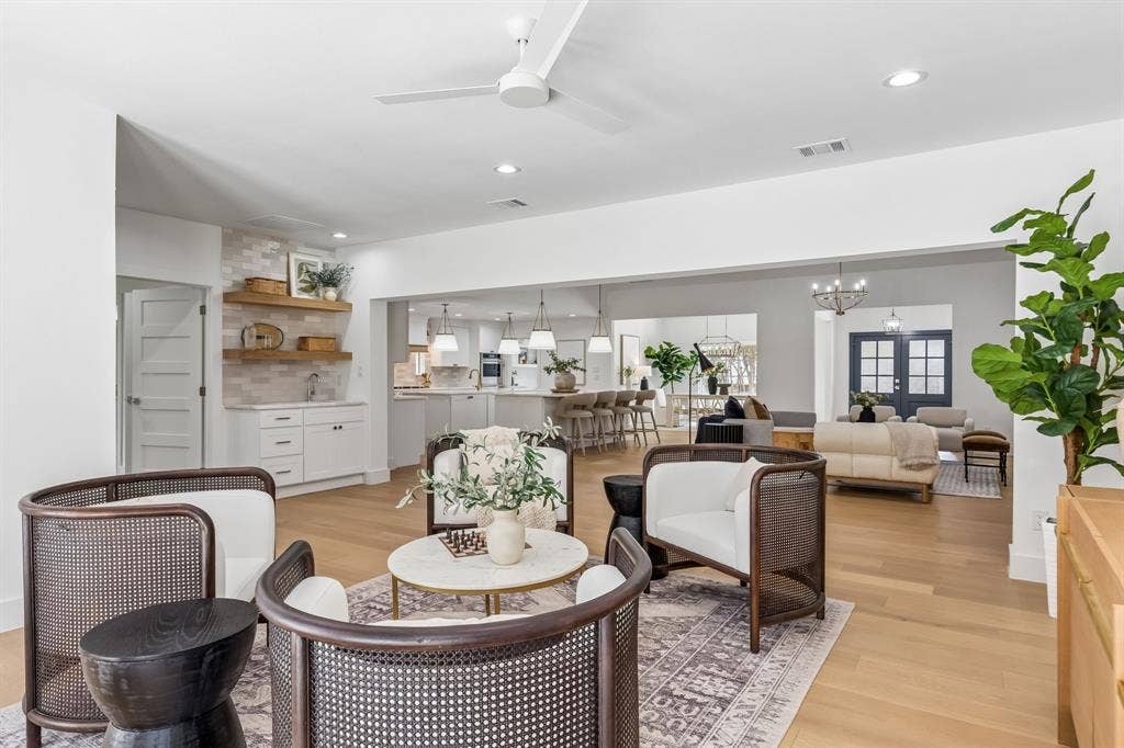 7124 Meadow Road, Dallas, TX 75230 Versatile sunroom,perfect as third living space or second dining area