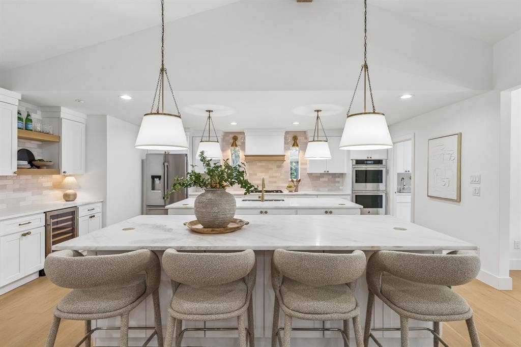 7124 Meadow Road, Dallas, TX 75230 Double island kitchen with an abundance of countertop space