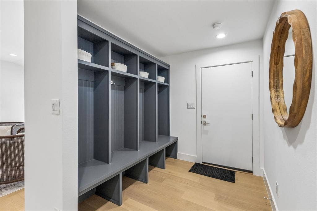 7124 Meadow Road, Dallas, TX 75230 Convenient mud lockers with upper and lower storage nooks