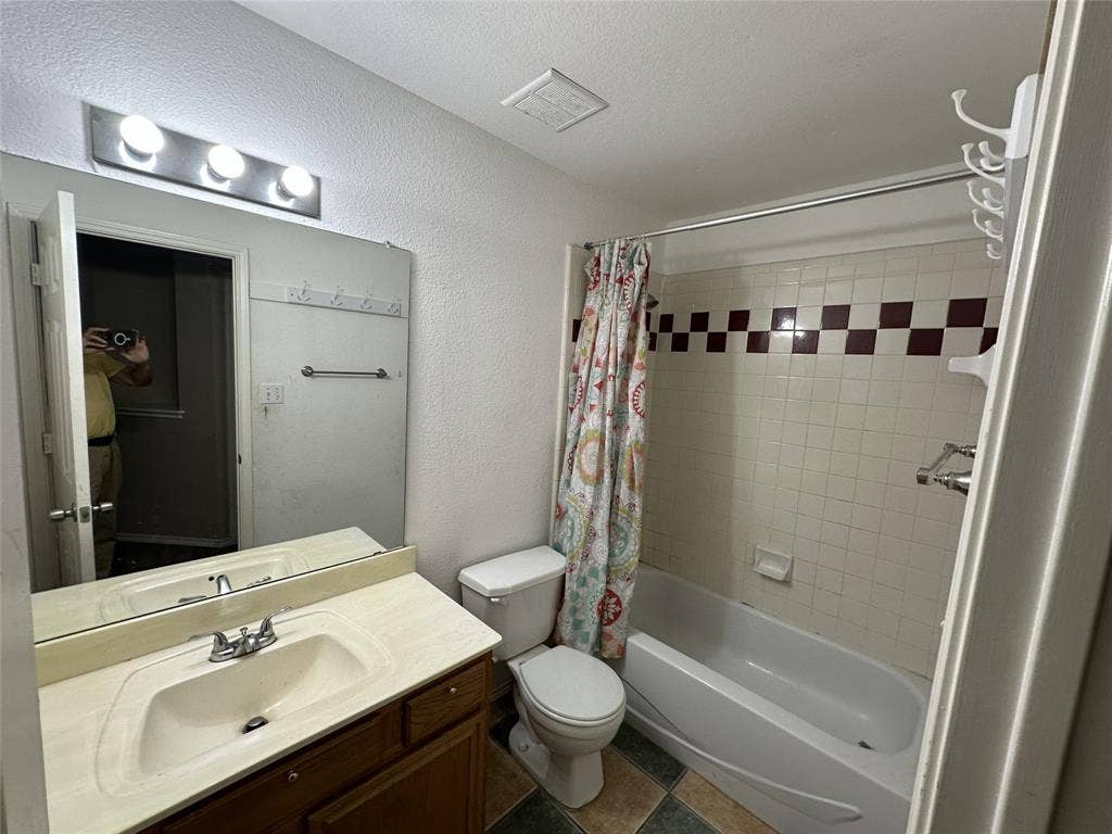 Vanity with integrated sink and chrome faucet