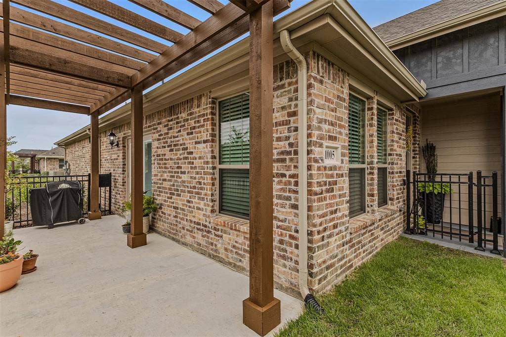 Gated grassy area of  of 1005 4th St, Argyle, TX in Harvest in Denton County, Texas