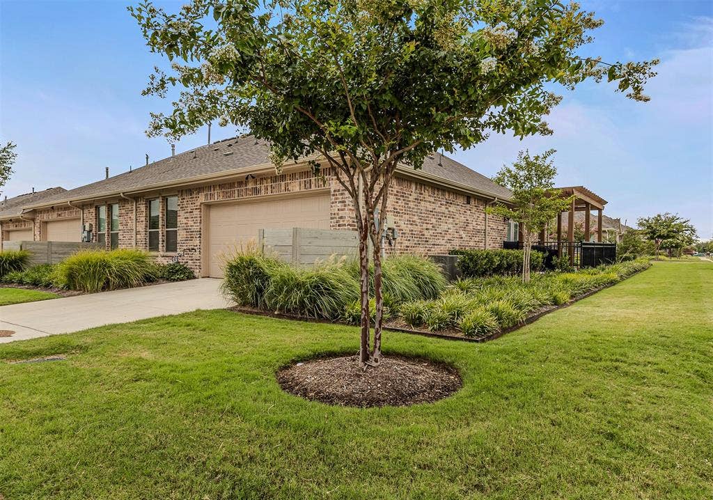 Rear entry garage of 1005 4th St, Argyle, TX in Harvest in Denton County, Texas