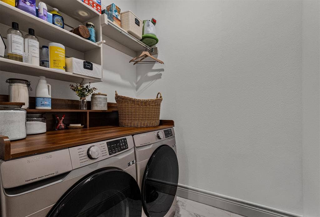 Laundry room of 1005 4th St, Argyle, TX in Harvest in Denton County, Texas