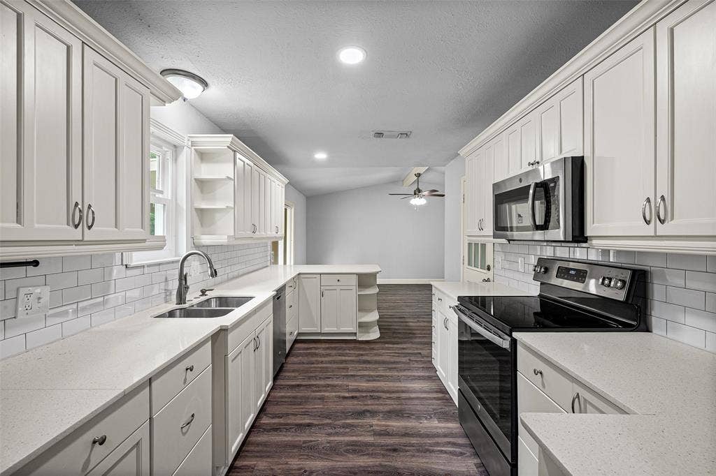 1005 Keller Avenue, Benbrook, TX 76126 So much storage behind these beautiful white cabinets.