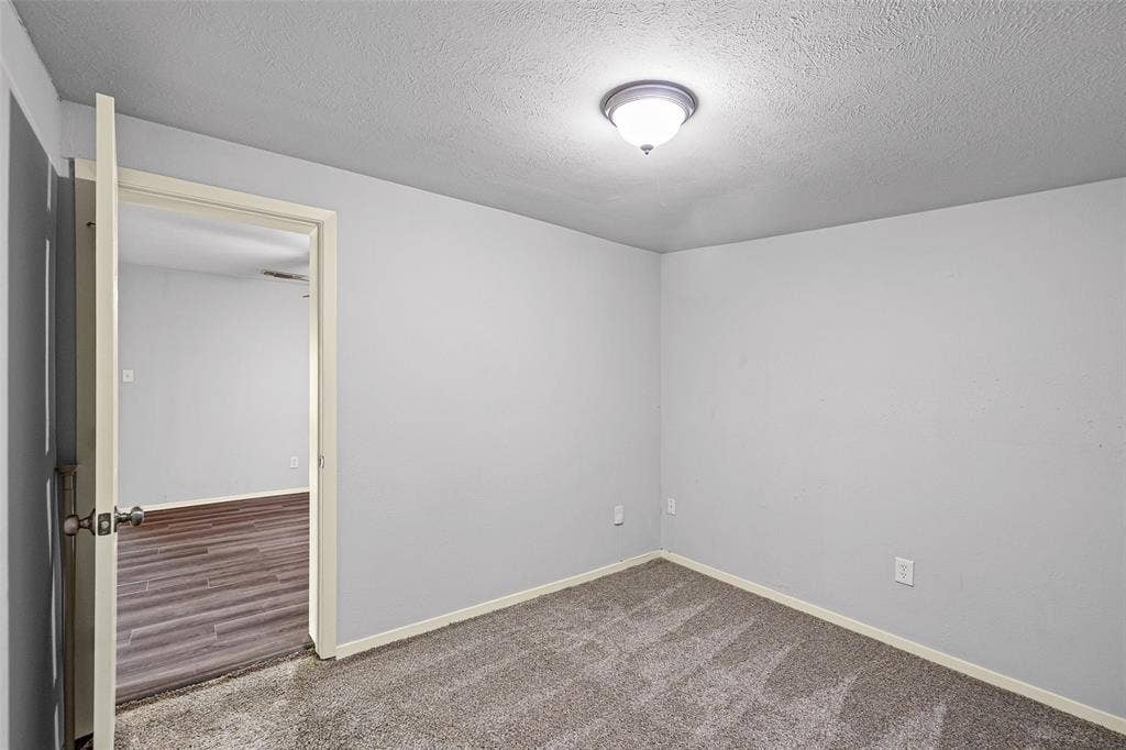1005 Keller Avenue, Benbrook, TX 76126 Extra sitting room off the primary bedroom. Possibilities are endless!