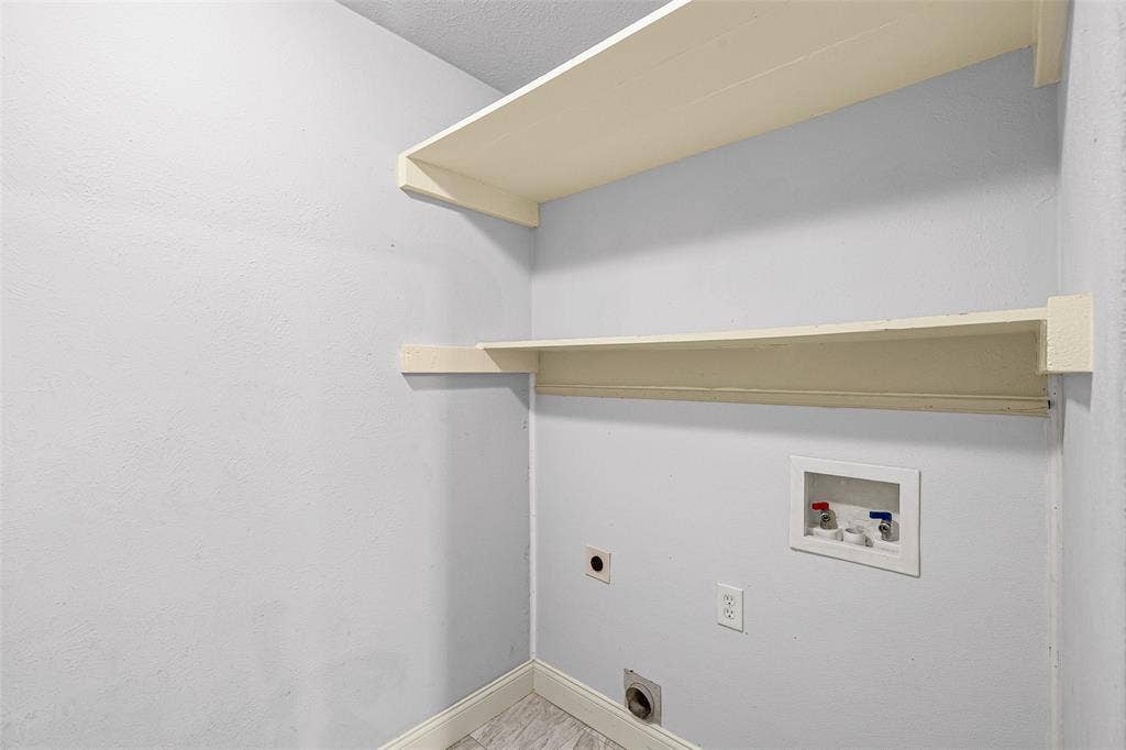 1005 Keller Avenue, Benbrook, TX 76126 Laundry and pantry share a space.