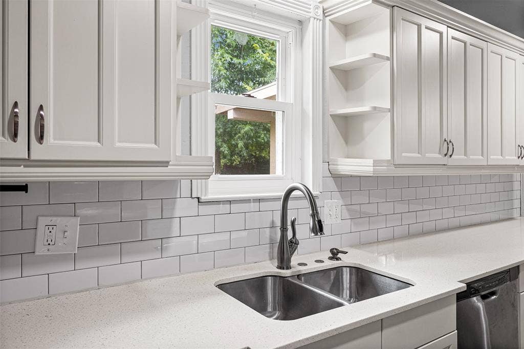 1005 Keller Avenue, Benbrook, TX 76126 Beautifully updated kitchen with timeless subway tiles.