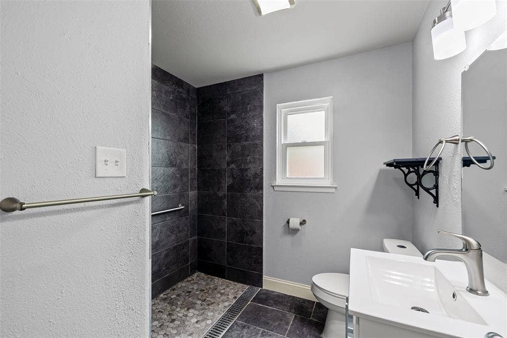 1005 Keller Avenue, Benbrook, TX 76126 Fully updated bathroom.