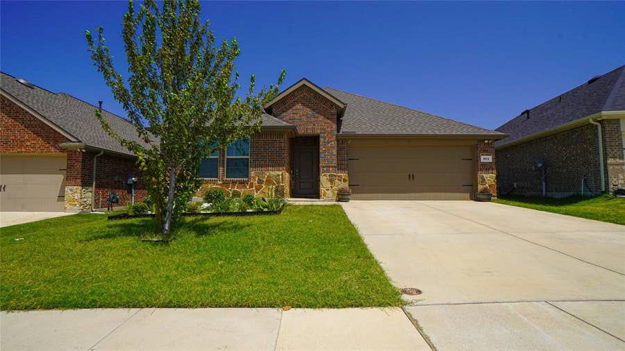 Property photo for 871 Philadelphia Street, Fate, TX