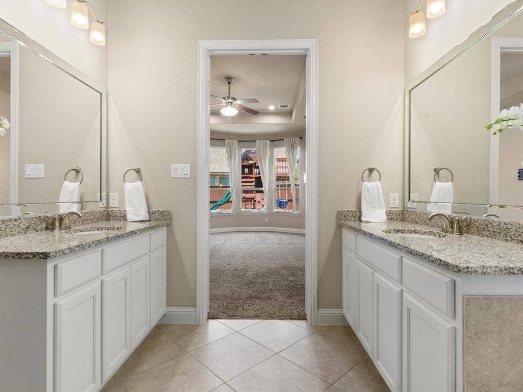 2703 Navarro Trail, Euless, TX 76039 Dual vanity with individual mirrors and light fixtures