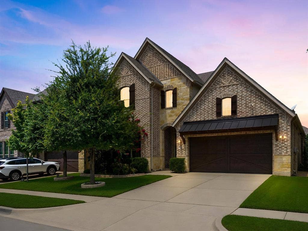 2703 Navarro Trail, Euless, TX 76039 Brick and stone exterior with architectural gables