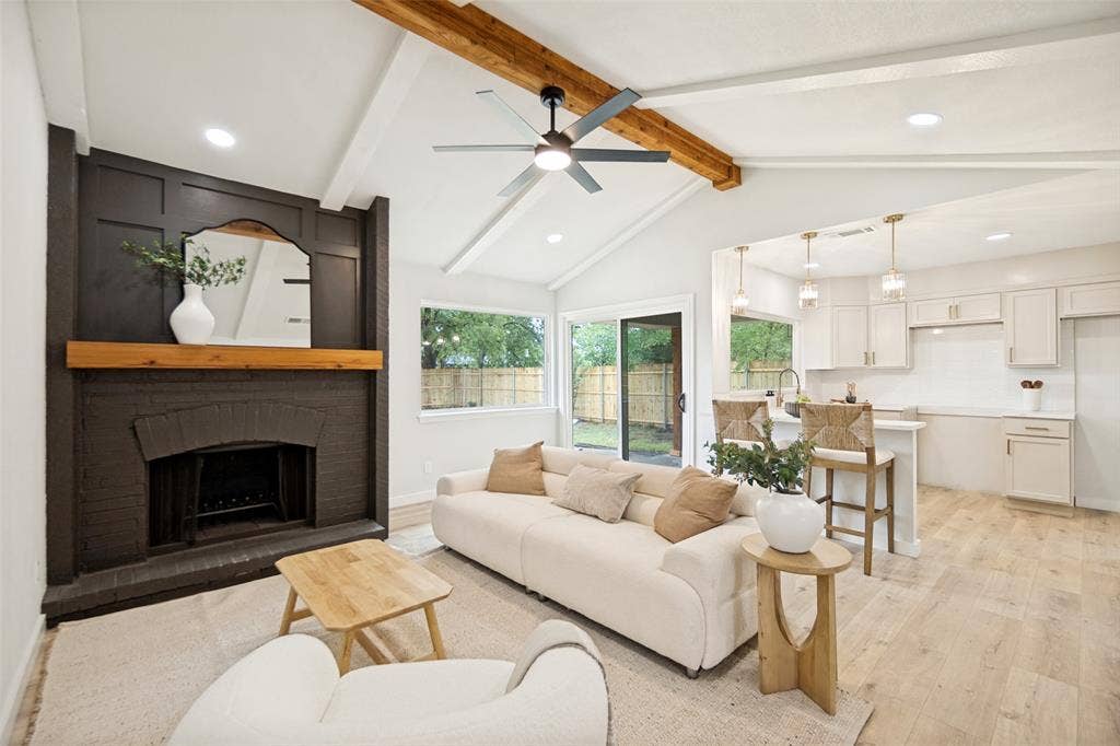 641 Stroud Lane, Garland, TX 75043 Vaulted ceiling with exposed wood beam and ceiling fan