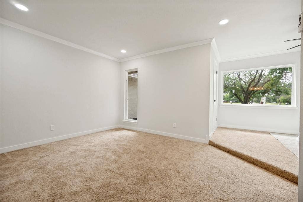 641 Stroud Lane, Garland, TX 75043 Carpeted interior space featuring recessed lighting and crown molding