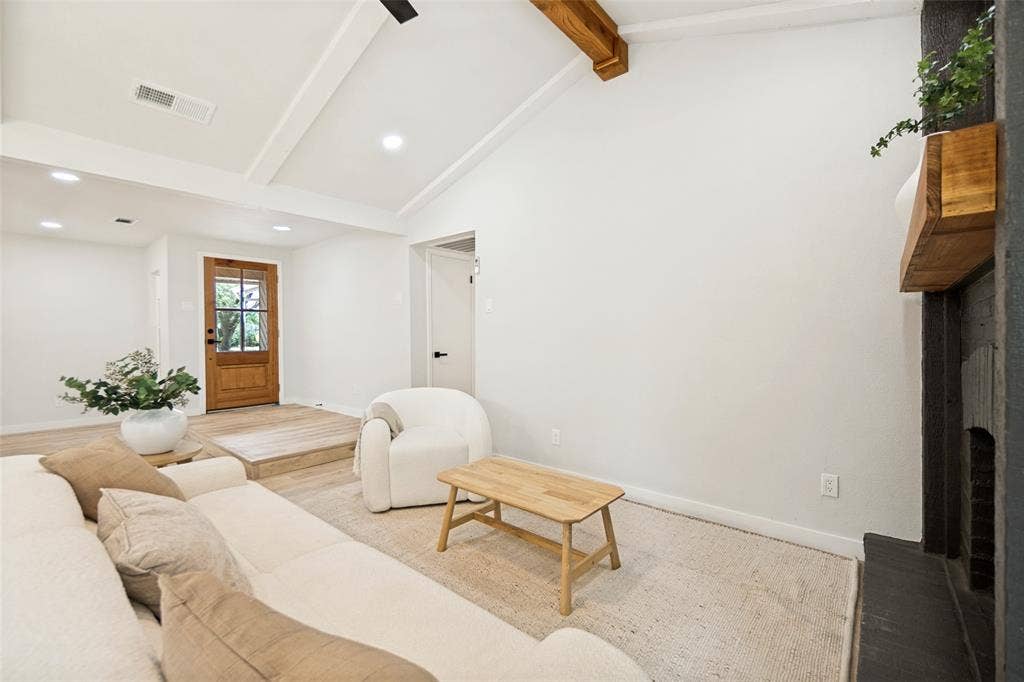 641 Stroud Lane, Garland, TX 75043 Vaulted white ceiling with exposed wood beams