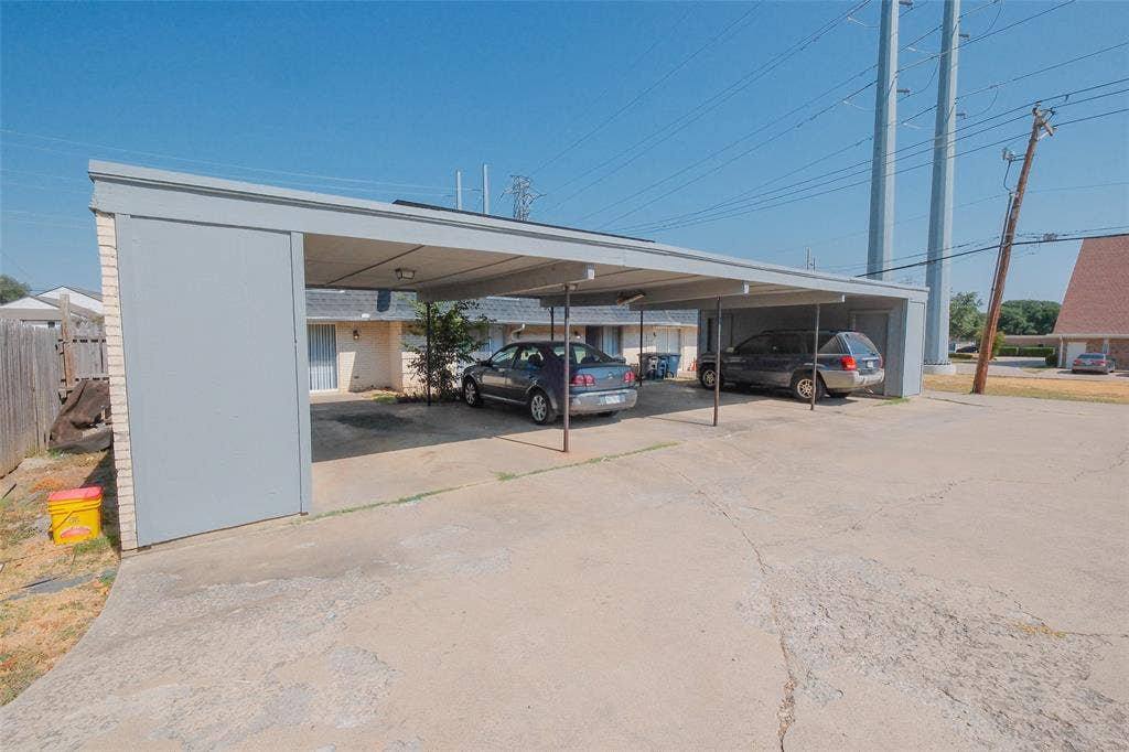 6317 Granbury Road, #6321, Fort Worth, TX 76133 Multi-car carport structure with a light gray finish
