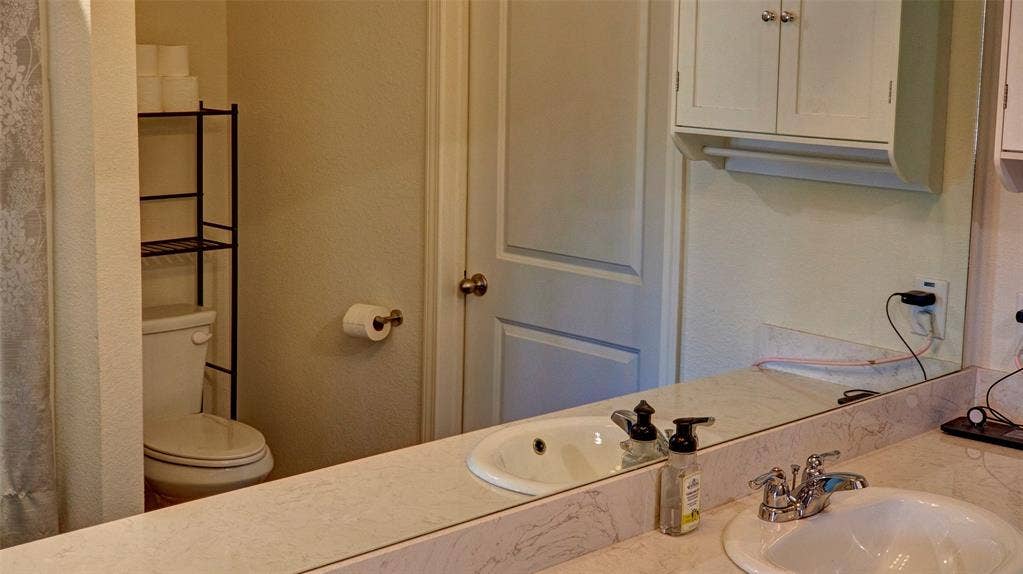 741 Windsor Court, Lavon, TX 75166 Dual vanity with integrated sinks and chrome fixtures