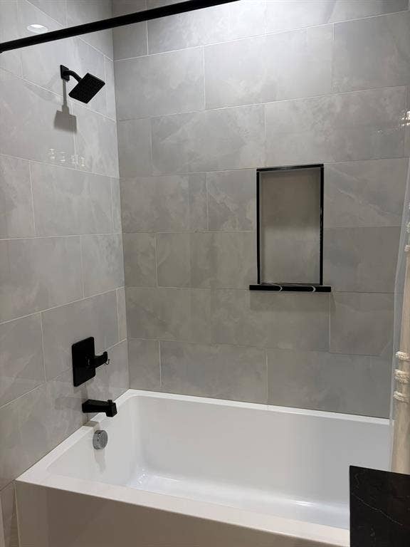 600 Lucas Drive, Athens, TX 75751 Bathtub with light gray large format tile surround
