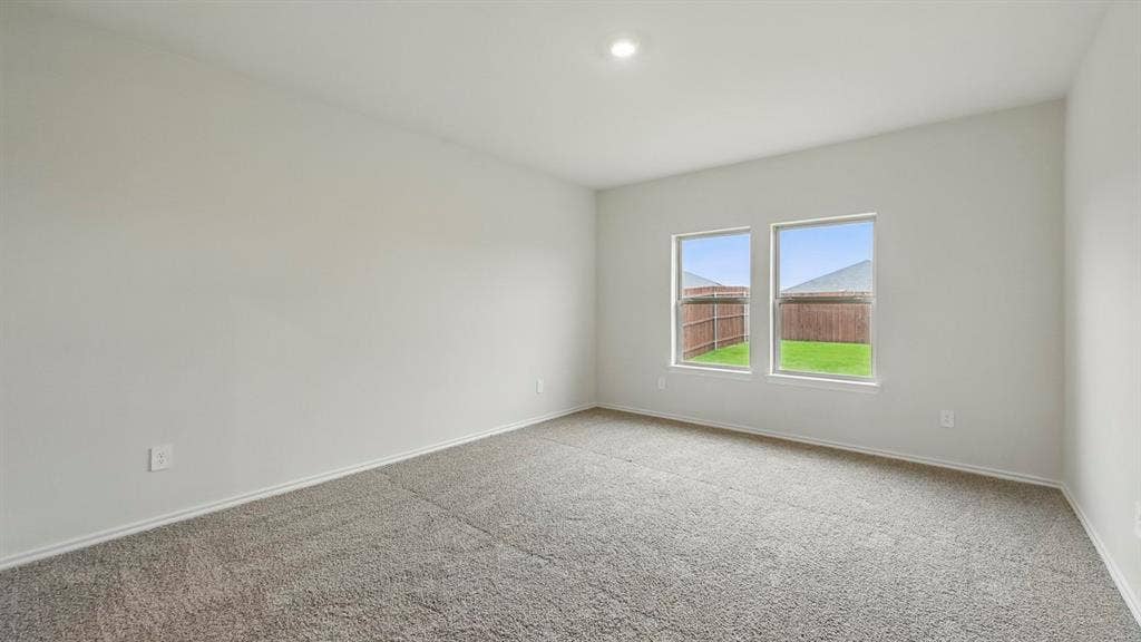 5602 Gannet Place, Crandall, TX 75114 Carpeted room with light-colored walls and baseboards