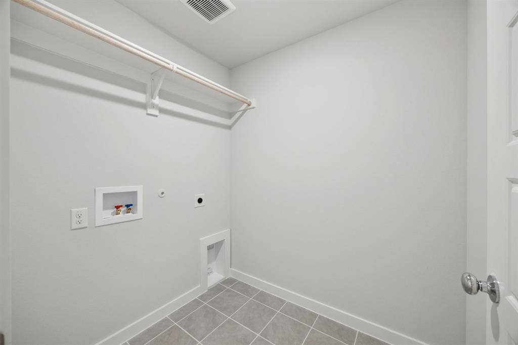 4211 Waco Drive, Farmersville, TX 75442 Utility Room in the Hadley home plan by Trophy Signature Homes – REPRESENTATIVE PHOTO