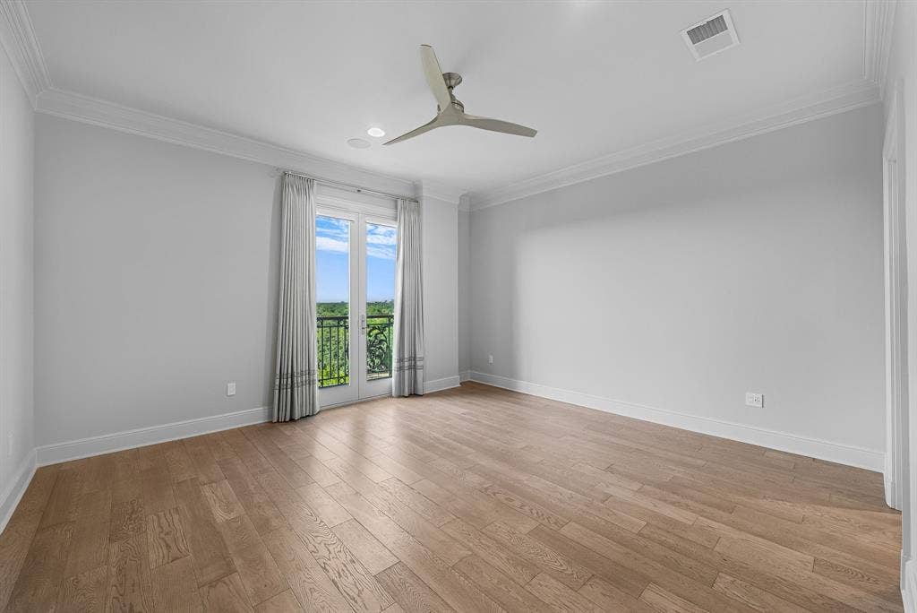 4240 Prescott Avenue, #8B, Dallas, TX 75219 Light-filled room featuring wood-finish flooring, a ceiling fan, recessed lighting, and crown molding