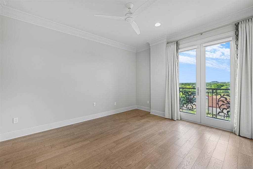 4240 Prescott Avenue, #8B, Dallas, TX 75219 Room featuring light wood-finish flooring and crown molding