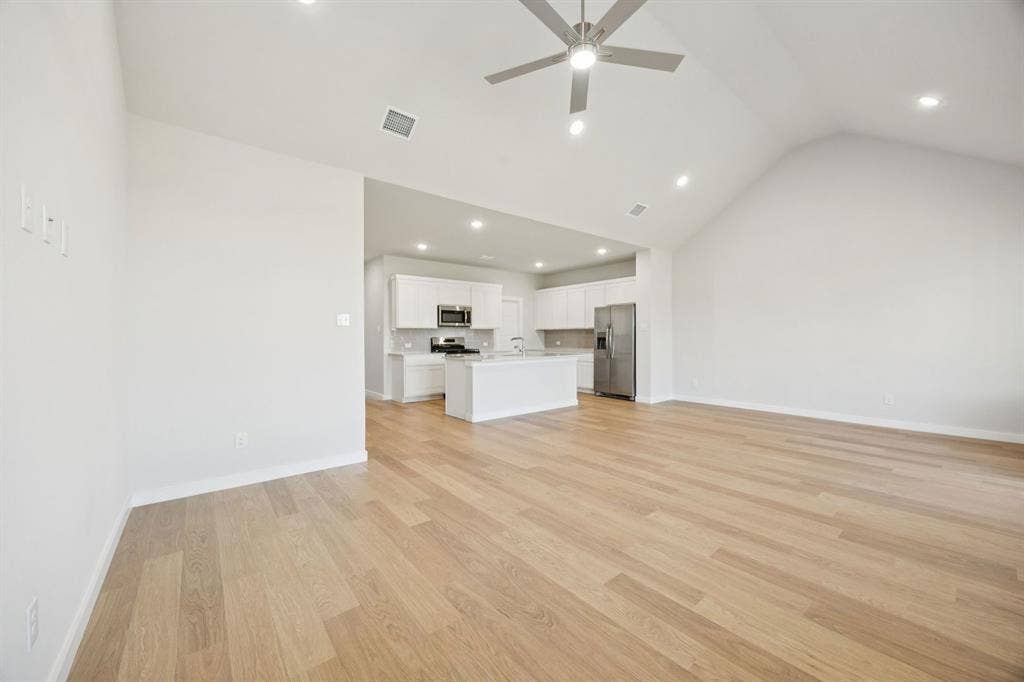 Open First Floor in the Masters home plan by Trophy Signature Homes – REPRESENTATIVE PHOTO