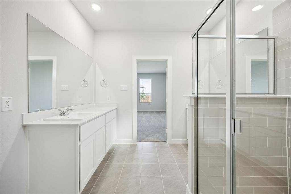 2029 Chariot Court, Seagoville, TX 75159 Primary Bathroom in the Masters home plan by Trophy Signature Homes – REPRESENTATIVE PHOTO