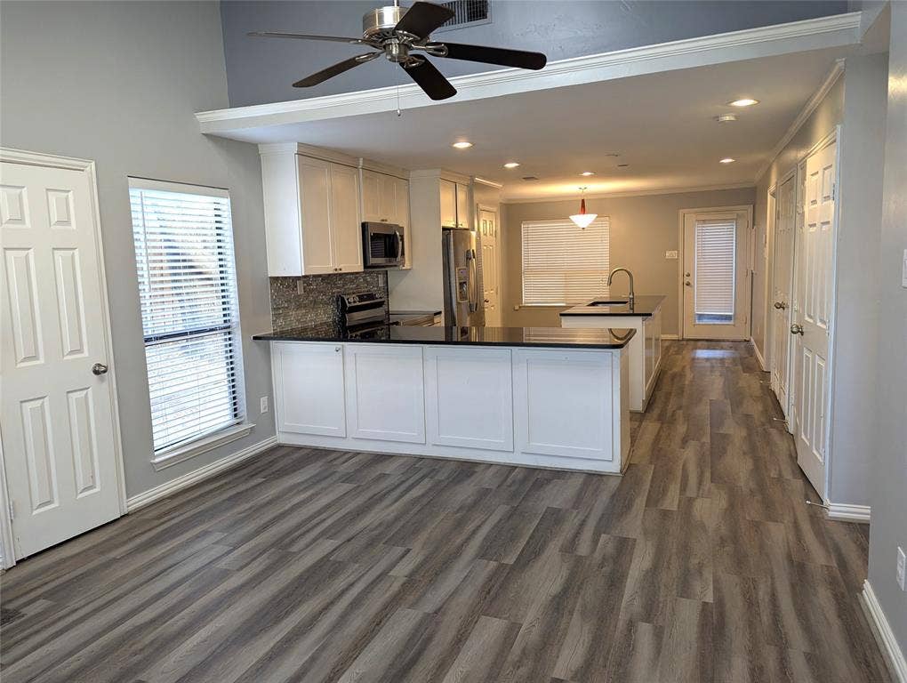 509 Pine Trail Drive, Allen, TX 75002 Open-concept living space with wood-finish flooring