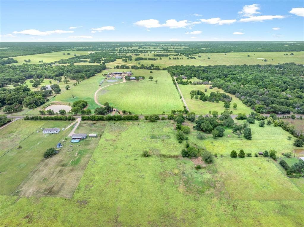 Lot 3R W. Cedar PKWY, Kemp, TX 75143 Expansive rural property featuring extensive green pastures and mature tree lines