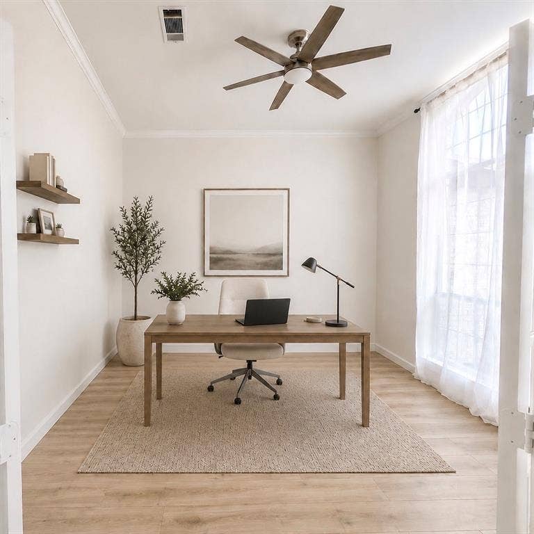 1706 Fairhaven Drive, Mansfield, TX 76063 Light-filled interior space featuring wood-finish flooring, a contemporary ceiling fan, and crown molding