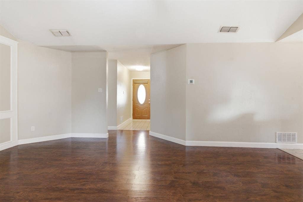 2502 Cranberry Lane, Euless, TX 76039 looking at the front door entry from the living room
