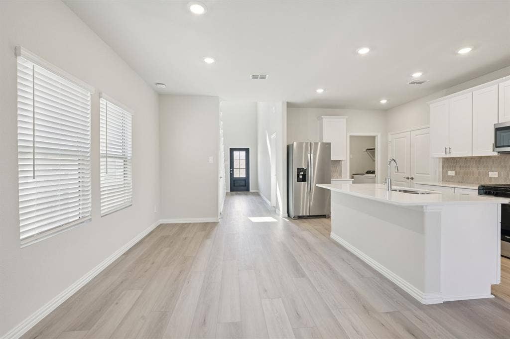 126 Winchester Hill Lane, Princeton, TX 75071 Photo is not of the actual home, but is an inspirational photo of builder’s model home and may depict options, furnishings, and/or decorator features that are not included.