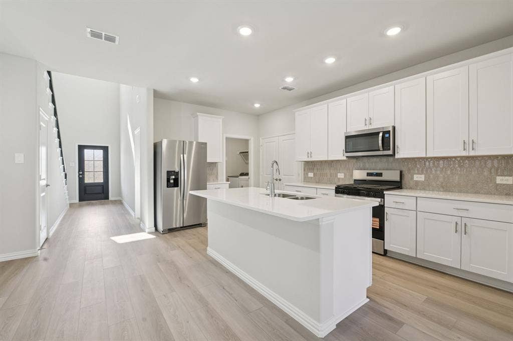 126 Winchester Hill Lane, Princeton, TX 75071 Photo is not of the actual home, but is an inspirational photo of builder’s model home and may depict options, furnishings, and/or decorator features that are not included.