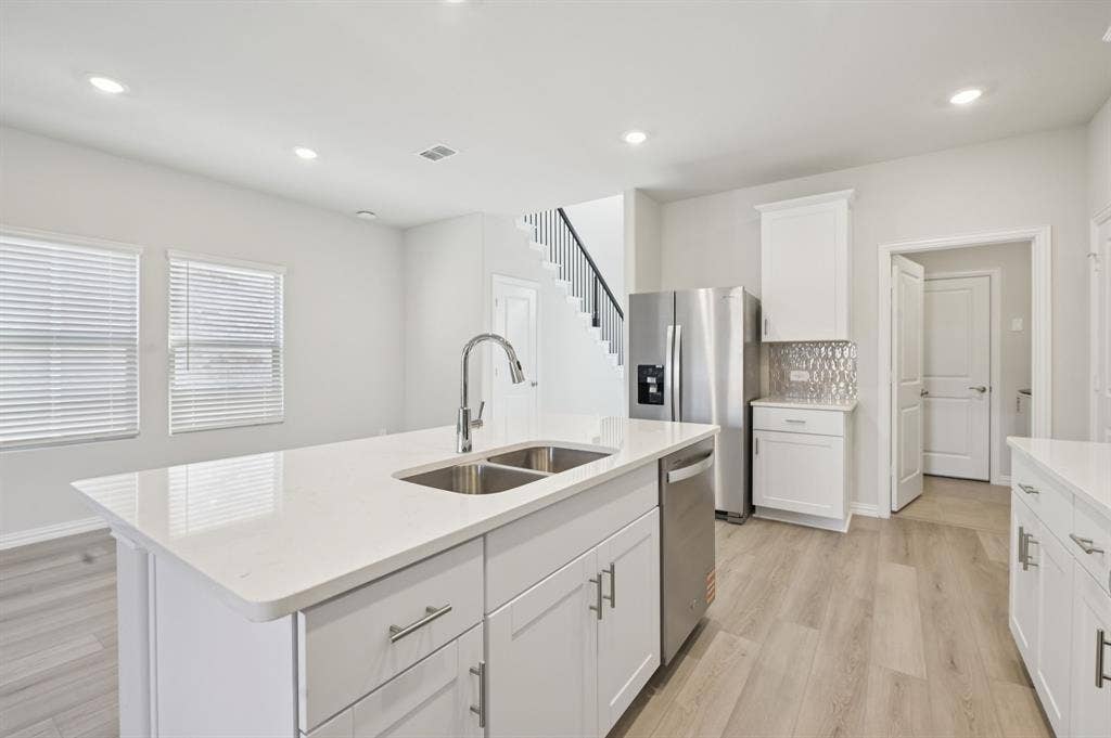 126 Winchester Hill Lane, Princeton, TX 75071 Photo is not of the actual home, but is an inspirational photo of builder’s model home and may depict options, furnishings, and/or decorator features that are not included.