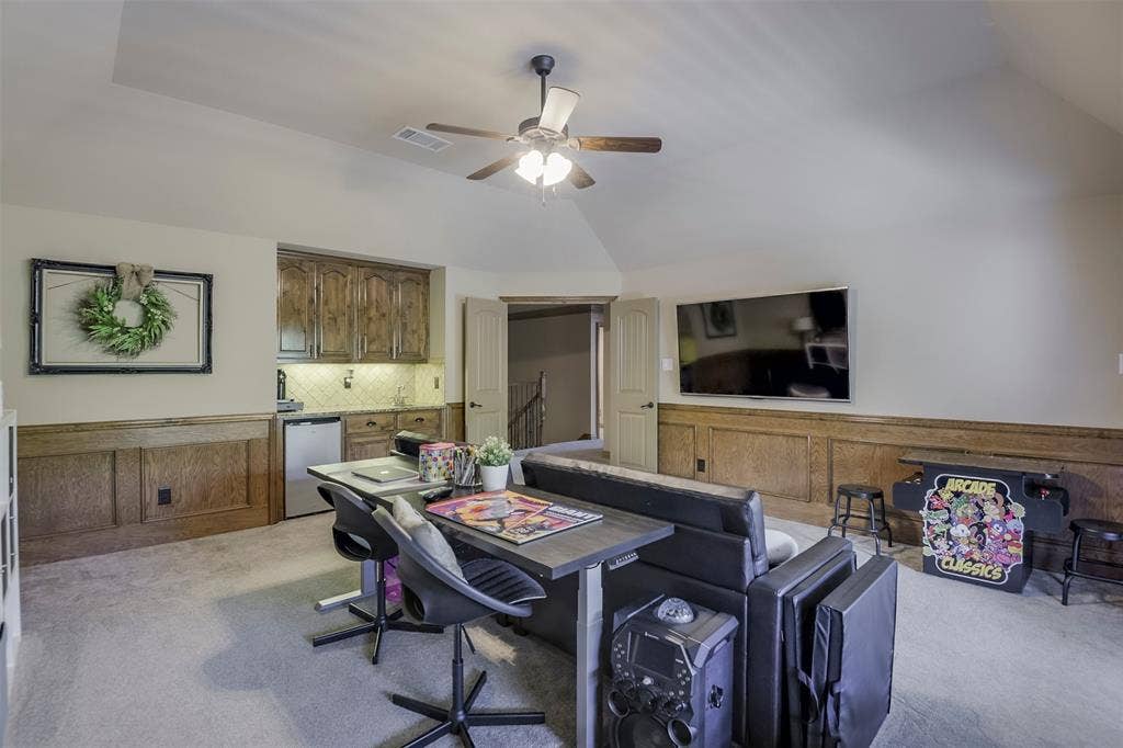 Upstairs Gameroom has space for desks for workspace.